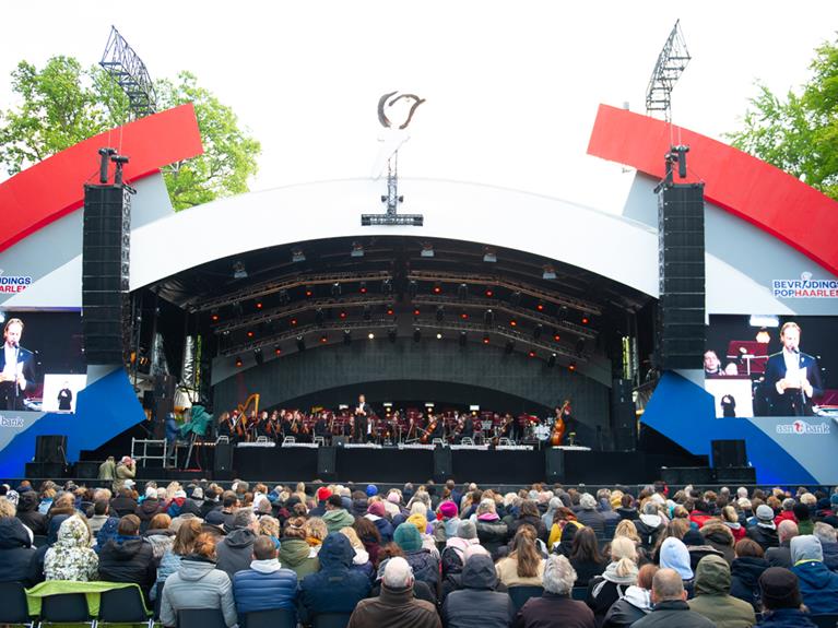 Bevrijdingspop Herdenkingsconcert met het Kennemer Jeugd Orkest en Rilan & The Bombardiers